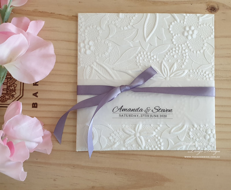 letterpress floral paper wedding invitations with lavender ribbon