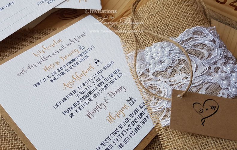 rustic wedding invitation wrapped with burlap and lace. Rustic boho romantic wedding theme.