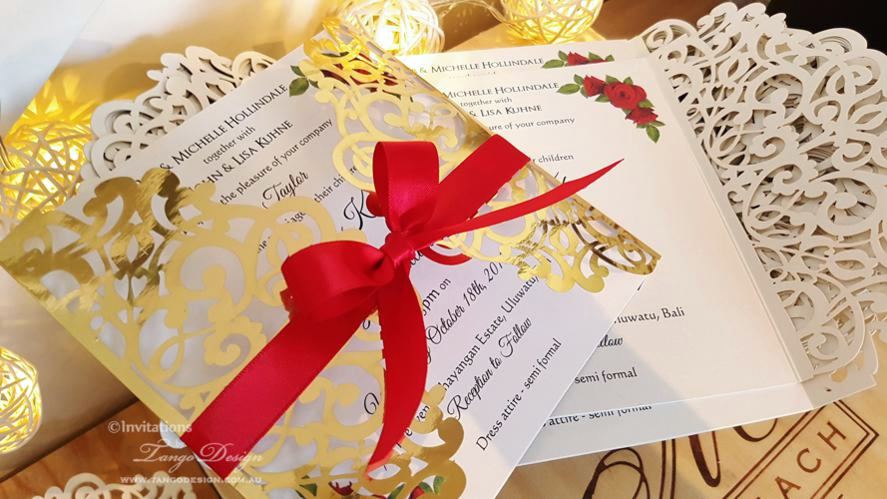 Christmas party invitations laser cut gold foil and red cards, printed in Australia.