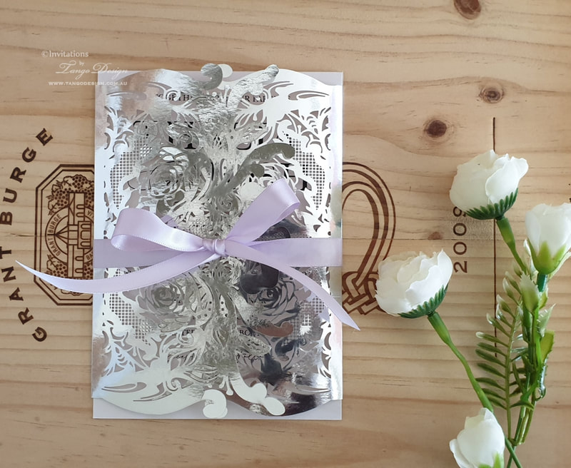 silver and lavender wedding invitation. Laser cut invites