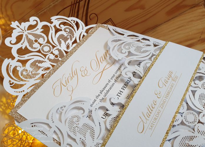 gold glitter band and backing wedding invitation with lasercut pocket invite