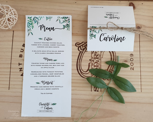greenery menu and greenery place cards personalised with guest names with rustic twine